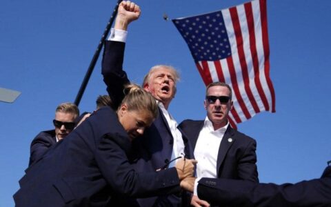 Former President Donald Trump with Secret Service agents after being shot at a campaign rally Saturday, in Butler, Pa